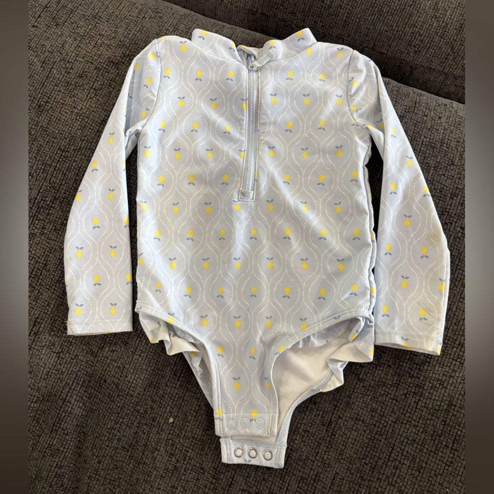 Carter's Blue and Yellow Baby Swimsuit with lemon pattern